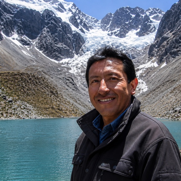 Carlos Mamani, Humantay Lake tour guide and high-altitude specialist, standing at Humantay Lake