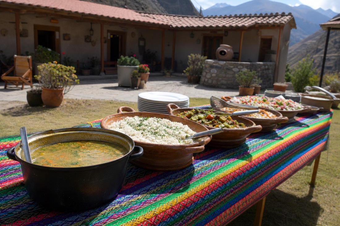 Buffet lunch dishes of soup, rice and vegetables laid out in a Mollepata courtyard after the hike